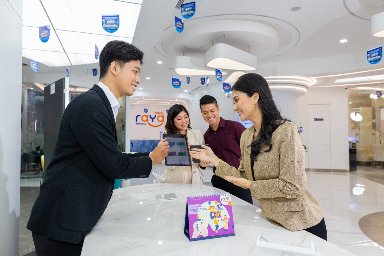 Bank Raya Tebar Promo di Hari Pelanggan Nasional, Nasabah Bisa Dapat Logam Mulia!